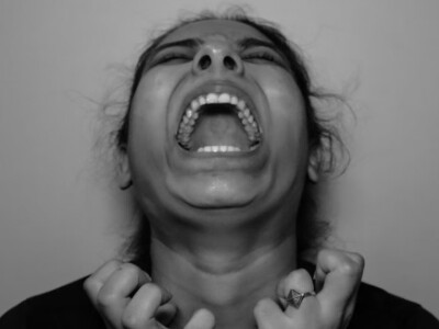 woman screaming in black and white